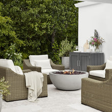 Load image into Gallery viewer, Havana Fire Bowl in Fog Color - Lifestyle Image Of The Fire Bowl In A Backyard