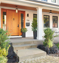 Load image into Gallery viewer, Boyleston LED Path Lights Two Dark Bronze Lights on Display on Each Side of a Front Entrance to a White Home, with Concrete Stairs and Pavers. Off Front View