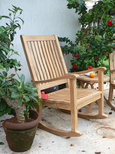 Del-Amo Rocking Armchair In Garden Next To Plants