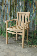 Load image into Gallery viewer, Classic Stackable Armchair - 4 Chair Set Outside In Front Of Bamboo