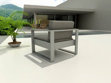 Load image into Gallery viewer, Lucca Armchair w/ Cushion On Patio Near A Pool And Plant