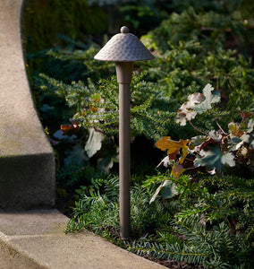 Saratoga LED Path Light Single Dark Bronze Light Featured On A Path In A Garden